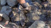 Si bien el agua entra, la zapatilla seca bien